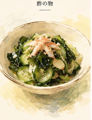 A small glass bowl of sunomono with thin cucumber slices, a few pieces of wakame seaweed, and a pale golden vinegar dressing